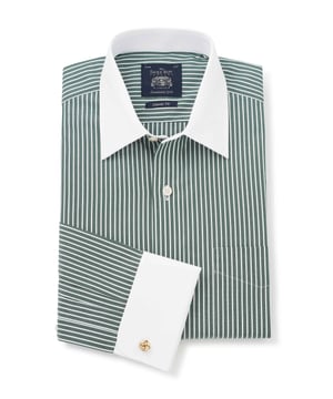 A nod to classic Winchester heritage, this dark green formal shirt features bold reverse stripes paired with a crisp white collar and matching cuffs. Crafted from 100% cotton for lasting comfort, it's the ultimate statement piece for the office - where tradition meets unmistakable style. Contrast white curl resistant Windsor collar, with an integral and removable collar stay. 100% BCI cotton poplin; smooth to the touch, classic reverse stripe design. Generously proportioned classic fit. Curl resistant Windsor collar. Contrast white collar and cuffs. Split yoke, long tails, chest pocket. Machine washable at 40°C. We advise washing with a colour catcher for best results.