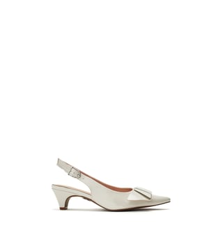 Navigate the season in Nutmeg, the slingback, kitten-heel sandal. This style features a chic pointed toe with a bow embellishment. The low heel provides wearable height, whilst the leather lining ensures all-day comfort.