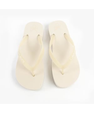 These women's flip-flop sandals feature a platform heel, breathable synthetic lining, and slip-on design, offering comfort and casual style for everyday wear