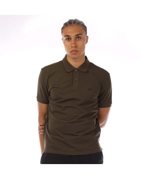 Mens C.P. Company Stretch Piquet Logo Polo Shirt in green.- Classic collar.- Short sleeves.- Two button placket.- Branding on the left of the chest.- Elasticated cuffs.- Regular fit.- 95% Cotton  5% Elastane.- Ref: 18CMPL097A683