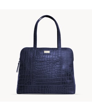 The designer 'Eva' tote bag in black real croc leather is a beautiful timeless design chosen for its lightweight characteristic. Unlined and spacious interiors ensure that you don't run out of space whether you're commuting. Add a touch of sophistication to all your outfits with the 'Eva' tote bag, a must have addition to your collection of handbags. Zip top opens to a roomy interior providing extra security to your belongings. Comes unlined with an exposed, soft to the touch natural leather interior. Extremely lightweight and leather handle for a comfortable carry on your shoulder. Slip pockets on either side to slide in your essentials. Adorned with the inimitable Assots London brushed gold metal logo for that designer look. Fittings Colour: Antique Brass. Composition: Body: 100% Genuine Leather. Lining: Unlined. DISCLAIMER : All pictures shown are for illustration purpose only. Actual product colour may vary due to different ambience lighting or the screen display settings.