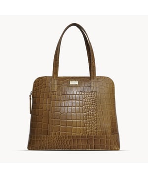 The designer 'Eva' tote bag in black real croc leather is a beautiful timeless design chosen for its lightweight characteristic. Unlined and spacious interiors ensure that you don't run out of space whether you're commuting. Add a touch of sophistication to all your outfits with the 'Eva' tote bag, a must have addition to your collection of handbags. Zip top opens to a roomy interior providing extra security to your belongings. Comes unlined with an exposed, soft to the touch natural leather interior. Extremely lightweight and leather handle for a comfortable carry on your shoulder. Slip pockets on either side to slide in your essentials. Adorned with the inimitable Assots London brushed gold metal logo for that designer look. Fittings Colour: Antique Brass. Composition: Body: 100% Genuine Leather. Lining: Unlined. DISCLAIMER : All pictures shown are for illustration purpose only. Actual product colour may vary due to different ambience lighting or the screen display settings.