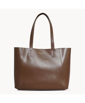 The 'Adela' genuine leather tote bag is beautifully handcrafted from premium Italian finish semi-soft and supple leather. Chosen for its durability, this timeless piece adds a touch of sophistication to all your outfits. Ideal for travel, meetings and everyday use, this chic handbag is a must-have addition to your collection of designer bags. Unlined for a robust and hard-wearing central compartment with an exposed, soft to the touch natural leather interior. Magnetic fastening closure opens to a roomy and spacious interior. Reinforced handle stitching to avoid snapping due to the load in the bag. Soft leather shoulder handles for a comfortable carry. Adorned with the inimitable Assots London clean finish gold embossed logo. Fittings colour: Shiny Gold. Composition: Body: 100% Genuine Leather. Lining: Unlined. DISCLAIMER : All pictures shown are for illustration purpose only. Actual product colour may vary due to different ambience lighting or the screen display settings.