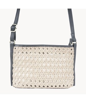 Experience luxury with our signature Assots London 'Leather Loom' woven real leather crossbody bag. Handcrafted from the finest full grain leather, this versatile everyday companion features a stunning woven design achieved through an artisanal slot weave technique. A beautiful, sophisticated bag with a unique sense of movement with detachable black full grain leather shoulder handle. Beautiful woven design with the finest full grain genuine leather. Black full grain soft leather adjustable shoulder handles for a comfortable carry. Lightweight. Opens to a roomy and fully lined interior to accommodate all your essentials. Lined with pure cotton fabric. Internal slip pocket for your mobile phone. Internal zip pocket for your house keys and car keys. Hardware: Antique Brass, Composition: Body: 100% Genuine Leather, Lining: Cotton.