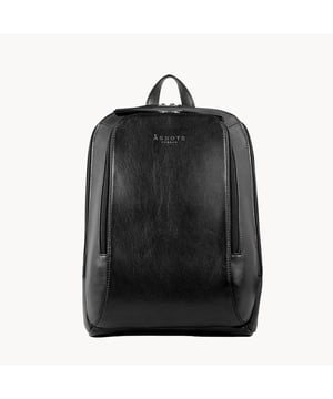 A timeless design full grain leather backpack made from the Assots exquisite natural Buff Calf grain leather making it an ideal business, travel and/or university bag. The handmade leather backpack 'Baker' is the new briefcase apt to carry all your essentials such as 13" laptops  and Ipads safely. The two way leather zip backpack around its compartments accommodates all your accessories while keeping you effortlessly stylish. A beautiful must-have addition to your collection of vintage leather bags. Padded and adjustable shoulder strap for comfort. Lightweight. Cushioned back for long lasting relaxed use. Two secured zip compartments with gusset. Internal utility features, include: Two loop pen holders. Slip pockets. Padded 13" laptop compartment. Fittings colour: Silver. Composition: Body: 100% Genuine Leather. Lining: 100% Cotton. DISCLAIMER : All pictures shown are for illustration purpose only. Actual product colour may vary due to different ambience lighting or the screen display settings.