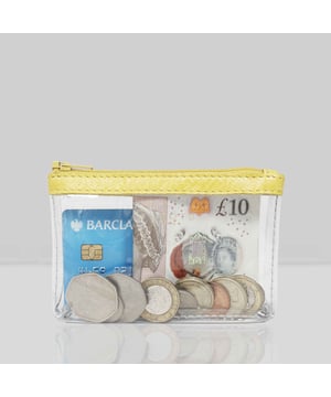 Size:13cm x 8.5cm x 2cm. The Dinah Transparent Zip Top Coin Purse is a unique handcrafted leather accessory that combines practicality with a fashionable twist. Its transparent design is sure to draw attention, while its compact size makes it an ideal accessory for any occasion. Composition:Body: Genuine Leather, PU transparent, Lining: Polyester.