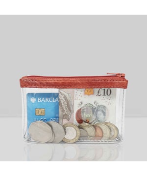 Size:13cm x 8.5cm x 2cm. The Dinah Transparent Zip Top Coin Purse is a unique handcrafted leather accessory that combines practicality with a fashionable twist. Its transparent design is sure to draw attention, while its compact size makes it an ideal accessory for any occasion. Composition:Body: Genuine Leather, PU transparent, Lining: Polyester.