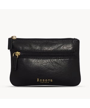 Keep things simple with this small coin purse crafted from super soft and supple natural grain Nappa leather. Featuring a simple compartment that opens along the top, the 'Mary' has a fully lined matching interior that is ideal for the basics. Comes in four more bright colours to spot easily in your bag. Zip top closure. Zip pocket at the front. Embellished with gold metal zippers and an inimitable Assots London golden foil embossed logo. Fittings: Gold Composition: Body: 100% Genuine Leather. Lining: 100% Polyester. DISCLAIMER : All pictures shown are for illustration purpose only. Actual product colour may vary due to different ambience lighting or the screen display settings.