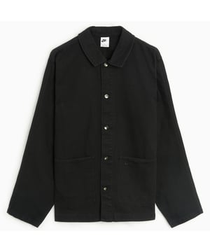 Elevate your wardrobe with the Nike Black Overshirt, crafted from 100% cotton for breathable comfort and durability. This men's overshirt features a classic collar and a button fastening that allows for easy layering and a relaxed, loose fit that moves with you. Practicality meets style with two front pockets, perfect for keeping essentials close at hand. The iconic Nike Swoosh embroidered on the left pocket adds a subtle yet distinctive touch of brand authenticity. Made in Vietnam, this versatile overshirt is ideal for casual outings or adding a sporty edge to your everyday look