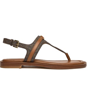 The Michael Kors Mandy Thong brings effortless sophistication to your warm-weather wardrobe. Crafted with premium leather uppers in rich brown, these elegant flip flops feature a sleek minimalist design that transitions seamlessly from poolside to street. The durable rubber sole provides reliable grip and comfort for all-day wear. Perfect for elevating casual outfits with a touch of luxury, these versatile sandals embody the brand's signature refined aesthetic while delivering practical everyday functionality.