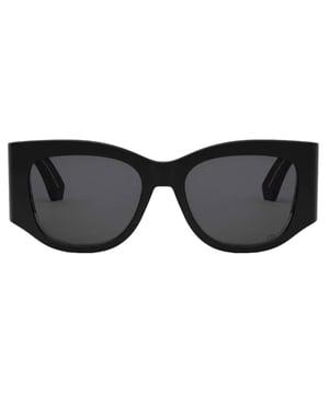 Elevate your style with the Dior DIORNUIT Black Sunglasses, featuring a sleek black frame paired with sophisticated smoke lenses. Designed for women who appreciate timeless elegance, these sunglasses offer both fashion and function by providing excellent protection against glare and UV rays. Their bold yet refined design complements any outfit, making them the perfect accessory for sunny days or stylish outings. Experience luxury eyewear that enhances your confidence and completes your look effortlessly. Made In Italy 100% Plastic