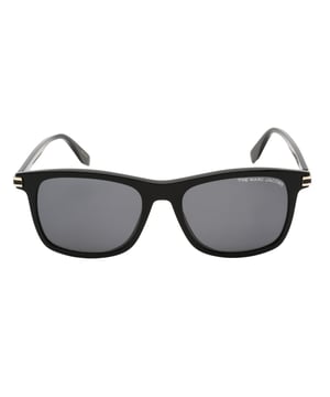 Elevate your style with the Marc Jacobs Black Gold Detail Sunglasses, designed for the modern man who values both fashion and function. Featuring a sleek black frame accented with luxurious gold details, these sunglasses offer a sophisticated look that complements any outfit. The grey lenses provide excellent protection against glare while ensuring clear vision in bright conditions. With precise measurements of 54x18x145mm, they deliver a comfortable fit for all-day wear. Perfect for adding a touch of elegance to your everyday ensemble, these sunglasses combine premium craftsmanship with timeless design. 100% Plastic