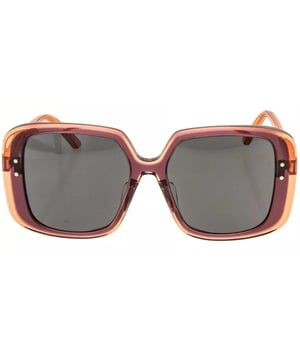 Elevate your style with the Dior DiorHighlight sunglasses, featuring a striking red frame that commands attention and smoke grey lenses that offer sophisticated protection from the sun. Designed for women who appreciate bold fashion statements, these sunglasses combine luxury and functionality effortlessly. The sleek design enhances any outfit, while the high-quality lenses ensure clear vision and UV protection. Perfect for making a confident impression, these Dior sunglasses are a must-have accessory for your collection. Experience the perfect blend of elegance and edge with DiorHighlight. Made In Italy 100% Plastic