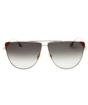 Elevate your style with the Victoria Beckham Gold Sunglasses, model VB239S 222. Featuring a sleek gold frame paired with smoke-tinted lenses, these sunglasses offer a perfect blend of luxury and sophistication. Designed for women, they provide a comfortable fit with dimensions of 63mm lens width, 9mm bridge, and 140mm temple length. Ideal for adding a touch of elegance to any outfit, these sunglasses not only protect your eyes from the sun but also make a bold fashion statement. Experience timeless glamour and exceptional quality with this must-have accessory. 100% Metal