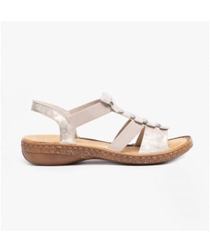 These synthetic women's sandals feature a cross-strap design with a round toe and flat heel, offering comfort for casual wear. They are lightweight and easy to fasten