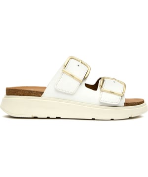Heben Sie Ihren lässigen Look mit den Fitflop Gen-Ff Buckle Two-Bar Sandalen in strahlendem Weiß hervor. Diese Lederslides vereinen Eleganz mit hervorragendem Komfort, dank der speziell entwickelten Zwischensohle und gepolsterten Innensohle. Das auffällige Zwei-Riemen-Design mit Schnallenverzierung bietet eine moderne Variante klassischer Sommerfußbekleidung. Diese passgenauen Sandalen sind auf einer robusten Gummisohle gefertigt und bieten zuverlässige Unterstützung für den ganzen Tag, ohne dabei auf Stil zu verzichten.