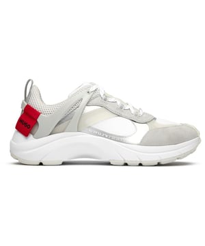 The Hugo Go 2 delivers sophisticated athletic style for the modern man. These white trainers blend performance-inspired design with premium materials, featuring a lightweight nylon upper that ensures breathability and comfort. With their sleek silhouette and rubber outsole providing reliable traction, these versatile HUGO sneakers transition effortlessly from casual outings to active weekends. A refined choice that balances contemporary aesthetics with practical functionality for your everyday wardrobe.