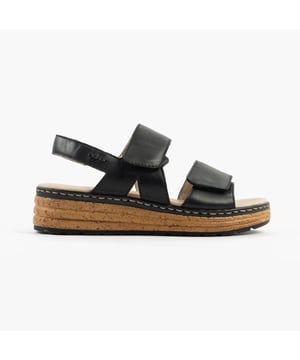 These open-toe women's sandals feature a leather upper, breathable lining, wedge heel, and extra-wide fit for comfort. Ideal for casual wear and easy to slip on with touch fasten closure