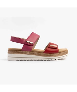 These women's open-toe sandals feature a leather upper and lining with a wedge heel, breathable design, and touch fasten closure, ideal for casual comfort