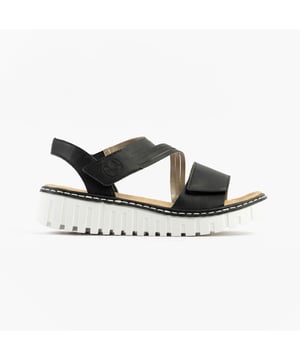 These women's open-toe wedge sandals feature a synthetic upper, breathable textile lining, and a RIRICON sole. Low heel height offers comfort for casual wear
