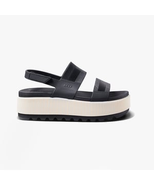 These open-toe women's sandals feature a synthetic upper, EVA lining and sole, a low platform heel, and a touch fasten closure, offering comfortable casual wear