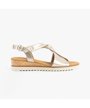 These women's open-toe wedge sandals feature a leather upper, textile lining, and rubber sole for comfort and lightweight wear, ideal for casual occasions