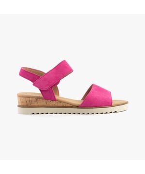 These women's open-toe sandals feature a suede upper, textile lining, rubber sole, and a low wedge heel. Lightweight and comfortable, they are ideal for casual wear