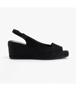 These women's slip-on sandals feature a textile upper and lining, rubber sole, low wedge heel, and open toe design, offering comfort and vegan-friendly style for casual wear