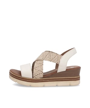 These women's wedge sandals feature a leather and synthetic upper, breathable textile lining, and a slip-on open toe design. Ideal for casual comfort and relaxed wear