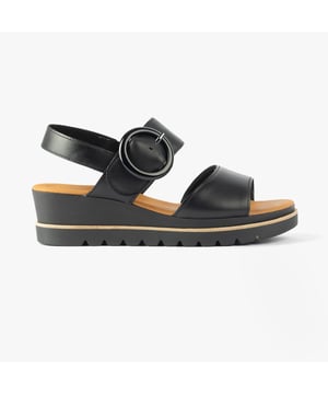 These women's open toe wedge sandals feature a leather upper, textile lining, and rubber sole for comfort and lightweight wear, ideal for casual occasions