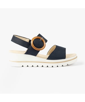 These women's open-toe wedge sandals feature a leather upper, textile lining, and synthetic sole for comfort and breathability, ideal for casual wear