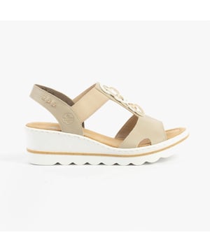 These women's wedge sandals feature a synthetic upper, breathable textile lining, and a slip-on design. Lightweight and comfortable, ideal for casual warm-weather wear