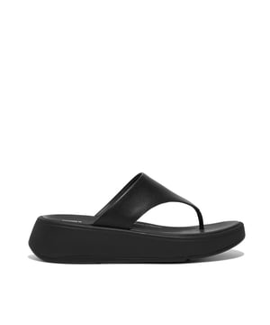 These toe post sandals feature a leather upper and rubber sole, offering comfort and slip resistance. Ideal for casual wear with a platform heel for added height