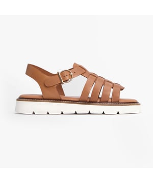These women's fisherman sandals feature a leather upper, polyurethane lining, rubber sole, and a buckle closure. Lightweight and comfortable, ideal for casual wear