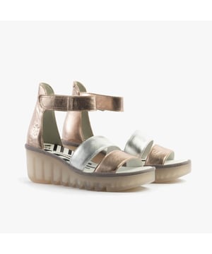These open-toe wedge sandals feature a leather upper and lining with a TPR sole, offering breathable comfort. Ideal for casual wear and easy to slip on with touch fasten closure