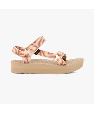These women's open-toe sandals feature a textile upper, EVA lining, rubber sole, and a low platform heel. Designed for comfort and vegan wear, ideal for casual occasions