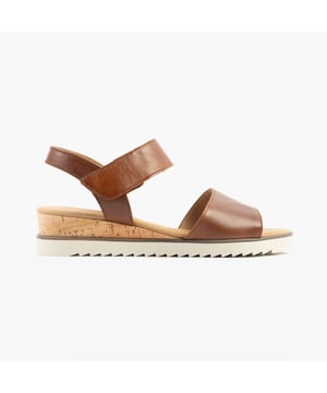 These women's open-toe sandals feature a suede upper, textile lining, rubber sole, and a low wedge heel. Lightweight and comfortable, they are ideal for casual wear