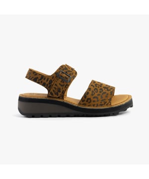 These open-toe wedge sandals feature a leather upper and lining with a TPR sole, offering comfort and breathability for casual wear