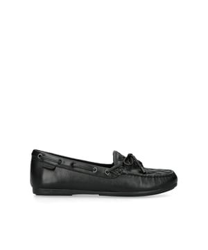 The Eagle Moccasin from Kurt Geiger is crafted from a black leather in an all-drench design. The toe features an overstitched quilt and a black eagle head.