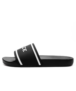 Step into effortless comfort and casual style with these Nicce Quenchin Men's Slidersthe perfect essential for everyday wear. Designed with practicality and modern aesthetics in mind, these sliders offer a lightweight feel with maximum durability and all-day comfort.
 Crafted with an EVA comfort upper, these Quenchin sliders provide a soft, flexible fit that gently supports your foot without weighing you down. The contoured footbed provides cushioned support, ensuring all-day comfort whether you're lounging or on the go. 
 Thanks to the convenient slip-on design, you can slide them on and off in secondsideal for quick errands or lounging at home. Finished with bold Nicce branding across the front, these sliders make a statement while staying true to the brands clean and contemporary look.
- EVA comfort upper
 - Contoured footbed
 - Sure grip outsole 
 - Slip On wear
 - Durable outsole
 - Nicce branding
 Please Note: These sandals are supplied polybagged (without box)