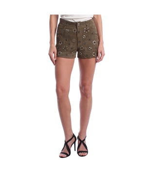 These Zadig & Voltaire shorts feature a soft, textured suede construction, embellished with floral-shaped metallic appliqués for a distinctive and sophisticated look. The design includes front and back pockets, a waistband with belt loops, and a front zip and button closure. The fitted silhouette and short length enhance the figure with a contemporary style.\n\n An ideal garment to add a touch of character to your summer looks.\n\n Details:\n Cut: Short, fitted to the hip.\n Exterior: Suede with decorative metal studs in floral pattern.\n Pockets: Functional front and back.\n Waist: With belt loops and decorative studded belt.\n Closure: Zipper and metal button.\n\n Designed to create a statement of style with personality, these women's shorts combine texture, shine, and design into a key piece inspired by bohemian and rebellious styles.\n Composition: 100% Goat Leather\n Care:\nHand wash.\n Do not use bleach or abrasive products.\n Do not tumble dry.\n Do not iron.