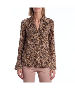 This Zadig & Voltaire shirt stands out for its sophisticated abstract floral print, featuring a relaxed silhouette that combines elegance and originality. The ruffle detail along the front placket adds movement and a romantic feel, while the exposed buttons and classic collar balance the design with a structured touch. Ideal for pairing with both formal trousers and jeans, this garment is versatile and timeless.\n\n Details:\n - Cut: Straight shirt with slightly rounded hem.\n - Collar: Classic with defined lapels.\n - Closure: Visible front buttons.\n - Sleeves: Long with opening at the cuff.\n - Print: Multicolor abstract floral with integrated signatures.\n\n A distinctive and sophisticated women's shirt that adds character to any look, ideal for those looking to stand out with elegance.\n Composition: 100% Viscose\n Care:\nMachine wash on a delicate cycle. Do not bleach. Do not tumble dry. Iron at low temperature if needed.