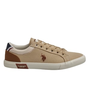 These US Polo Assn. sneakers combine casual style and everyday comfort. With a versatile design and iconic brand details, they're ideal for a relaxed look without losing personality.\n\n Details:\n - Durable canvas upper with reinforcements in key areas; some models come with leather, synthetic leather, and suede combination uppers.\n - Padded textile inner lining for greater comfort.\n - Flat laces and metal eyelets for a secure fit.\n - Non-slip rubber sole with institutional detail on the side.\n - Logo on the side as a distinctive seal.\n\n A comfortable and timeless option for those looking for lightweight footwear with a sporty style and urban essence. These men's casual sneakers are perfect for completing a casual look with the authentic seal of the US Polo Association.\n Composition: Exterior: Leather, Textile, Suede; Interior: Textile; Sole: Synthetic\n Care:\nClean with a soft brush and neutral soap.\n Avoid machine washing.\n Air dry, away from direct sunlight.