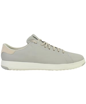 Minimalist, lightweight, and designed for modern movement, the Cole Haan GrandPrø Women’s Tennis Shoes in Grey combine sleek court-inspired aesthetics with innovative comfort. Whether you're navigating the city or enjoying weekend downtime, these trainers offer a versatile blend of style and performance.
Key Features
Lightweight EVA Midsole

Provides responsive cushioning and shock absorption without adding bulk—perfect for all-day wear.

Classic Tennis Sneaker Silhouette

Low-top profile with subtle retro detailing that works seamlessly with casual or smart-casual outfits.

Cushioned Ortholite® Footbed

Adds underfoot softness and moisture-wicking properties to enhance long-term comfort.

Durable Rubber Outsole with Traction Pods

Ensures flexible grip and stability on a variety of surfaces—from pavement to polished floors.

Lace-Up Closure

Allows for an adjustable, secure fit with a timeless look.

Padded Collar and Tongue

Boosts ankle comfort while providing subtle structure and support.

Soft Grey Colourway

Neutral, understated tone that complements everything from denim and joggers to dresses and skirts.

Whether you're dressing up your casual wardrobe or seeking reliable all-day comfort, the Cole Haan GrandPrø Women’s Grey Tennis Shoes deliver premium craftsmanship and sporty elegance in one essential pair.
