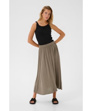 Dieser Damen-Midi-Rock bietet eine bequeme A-Linien-Passform, elastischen Bund und fließende Silhouette für Komfort und vielseitige Stylingmöglichkeiten. Die Midi-Länge unterstützt Bewegungsfreiheit und zeitlosen Stil.  Schonwäsche 30°, Nicht bleichen, Nicht im Trockner trocknen, Tropnass aufhängen, Warm bügeln max. 150° C, Trockenreinigung  100% Viskose