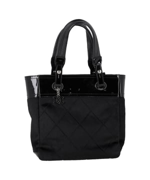 VINTAGE, RRP AS NEW
The Chanel Small Paris Biarritz Tote Bag in Black Calf Hair and Leather offers a perfect balance of luxury and functionality, featuring a chic combination of smooth leather and plush calf hair for a distinctive texture. Its compact size and structured shape make it an ideal choice for both everyday use and special occasions. Pair it with a tailored coat and boots for a sophisticated, city-ready look, or wear it with a casual dress and sneakers for a more relaxed yet elevated vibe. The timeless black color and signature Chanel design ensure it’s a versatile and statement piece in any wardrobe.

 Chanel Small Paris Biarritz Tote Bag in Black Calf Hair and Leather

Condition: Excellent
Signs of wear: No retail tag, No visible sign of wear., 
Packaging: None
Color: Black
Material: Calf hair
Size: One Size | One Size
Measurements: Width: 110; Height: 270; Length: 320; Handle drop: 190; Strap length: 0
SKU: NAPPUGBBA465190W