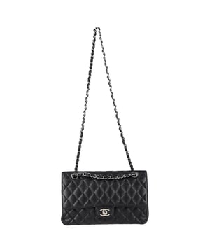 VINTAGE, RRP AS NEW
A timeless icon of Parisian elegance, the Chanel Medium Double Flap Bag in black caviar leather is the ultimate investment piece. Its signature diamond quilting, silver-tone CC turn-lock, and leather-threaded chain strap embody the house’s heritage of effortless sophistication. The structured silhouette opens to reveal an inner flap and a rich burgundy leather interior, complete with thoughtfully placed pockets — a masterclass in both form and function.


Chanel Caviar Quilted Medium Double Flap Bag in Black Leather
Condition: Excellent
Signs of wear: No retail tag, No visible sign of wear.,  light wear on interior
Packaging: Dust bag
Color: black
Material: Leather | leather
Size: One Size | One Size
Measurements: Width: 60; Height: 165; Length: 250
SKU: NAPPUGBBA504139W