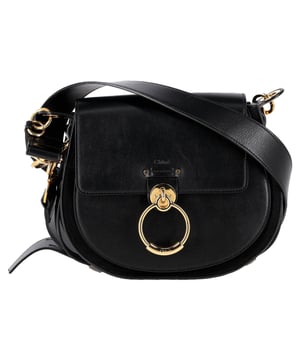 VINTAGE, RRP AS NEW
The **Chloé Small Tess Shoulder Bag in Black Calf Leather** exudes timeless Parisian elegance with its softly rounded silhouette, premium polished calf leather, and iconic scalloped gold-tone hardware—an instant classic that elevates any ensemble. Compact yet surprisingly spacious, it's designed with a refined magnetic flap and an adjustable chain-and-leather strap, offering effortless versatility from day to night.
**Style tip:** Embrace clean, sophisticated styling by pairing it with a tailored blazer and high-waisted trousers—the bag’s subtle curves will soften structured pieces for a harmonious, chic look.

 Chloé Small Tess Shoulder Bag in Black Calf Leather

Condition: Excellent
Signs of wear: No retail tag, No visible sign of wear., 
Packaging: Dust bag
Color: Black
Material: Leather | calfskin leather
Size: One Size | One Size
Measurements: Width: 80; Height: 200; Length: 250
SKU: NAPPUGBBA506814W