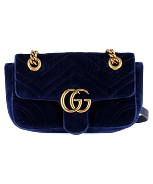 VINTAGE, RRP AS NEW
The Gucci GG Marmont Matelassé Small Bag in Blue Velvet is an exquisite accessory that exudes luxury and elegance. Crafted from chevron-quilted soft velvet in a captivating blue hue, this lovely bag features an aged gold chain shoulder strap with a leather shoulder pad, as well as an aged gold Gucci GG logo closure that adds a touch of opulence. Opening to reveal a lustrous pink satin interior with a practical zipper pocket, this bag seamlessly blends timeless style with functional design, making it the perfect statement piece for any sophisticated ensemble.
Gucci GG Marmont Matelassé Small Bag in Blue Velvet
Condition: Very good
Signs of wear: Minor scratches, tarnishing of hardware, & zip., Minor sign of wear or markings., 
Packaging: None
Color: Blue | blue
Material: Velvet | satin velvet
Size: One Size 
SKU: 398249 / NAPPUGBBA386263W  
Dimensions:  Length: 200 mm, Width: 50 mm, Height: 150 mm