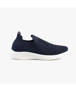These casual women's slip-on shoes feature a textile upper, breathable lining, and rubber sole with a low heel, offering comfort and easy wear for everyday activities
